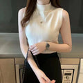 Victoria - Blusa lisa sin mangas